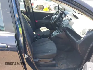 2015 Mazda 5 Sport with VIN JM1CW2BL0F0183911, listed as a IAAI auction lot 42116880 with 154,299 mi miles. Bid and sale history available at carsss.com. Image 5.