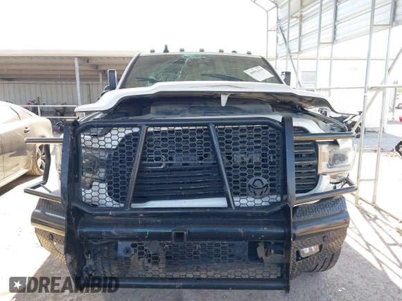 2021 Ram 2500 Laramie with VIN 3C6UR5NLXMG677847, listed as a IAAI auction lot 40992410 with 106,912 mi miles. Bid and sale history available at carsss.com. Image 12.