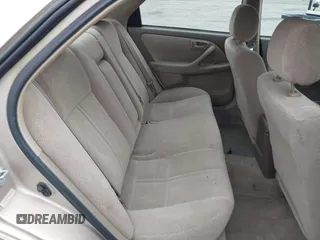 2001 Toyota Camry CE with VIN 4T1BG22K81U075758, listed as a IAAI auction lot 42024950 with 107,439 mi miles. Bid and sale history available at carsss.com. Image 8.