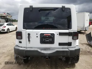 2015 Jeep Wrangler Unlimited Wrangler X with VIN 1C4BJWEG6FL614671, listed as a Copart auction lot 62286095 with 94,928 mi miles and Salvage title. Bid and sale history available at DreamBid. Image 6.