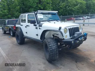 2014 Jeep Wrangler Unlimited Sport with VIN 1C4BJWDG1EL214307, listed as a IAAI auction lot 42325882 with 178,089 mi miles and . Bid and sale history available at DreamBid. Image 1.