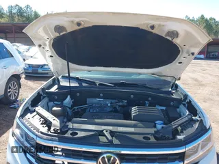 2021 Volkswagen Atlas SE z VIN 1V2DP2CA5MC511140, wystawiony jako IAAI lot #41703130 z przebiegiem 113 922 mil mil oraz . Historia ofert i sprzedaży dostępna na DreamBid. Obrazek 10.