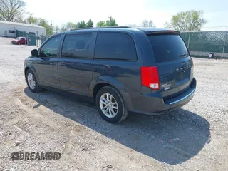 2014 Dodge Grand Caravan SXT z VIN 2C4RDGCG2ER120666, wystawiony jako IAAI lot #42031657 z przebiegiem 126 467 mil mil oraz . Historia ofert i sprzedaży dostępna na DreamBid. Obrazek 3.