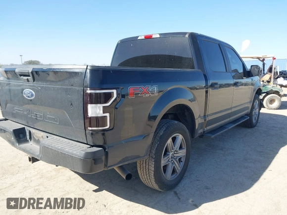 2018 Ford F-150 XL with VIN 1FTEW1E50JKE13640, listed as a IAAI auction lot 41228537 with 146,927 mi miles. Bid and sale history available at carsss.com. Image 4.