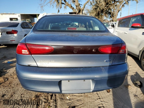1999 Ford Escort SE z VIN 1FAFP13P8XW292868, wystawiony jako Copart lot #78498564 z przebiegiem 154 668 mil mil oraz Nie do naprawy • Non repairable. Historia ofert i sprzedaży dostępna na DreamBid. Obrazek 6.