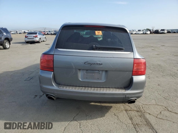 2005 Porsche Cayenne z VIN WP1AA29P65LA23655, wystawiony jako Copart lot #55174175 z przebiegiem 153 837 mil mil oraz Szkoda całkowita • Salvage title. Historia ofert i sprzedaży dostępna na DreamBid. Obrazek 6.
