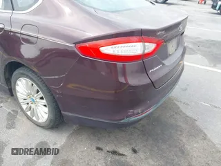 2013 Ford Fusion SE Hybrid with VIN 3FA6P0LU2DR178539, listed as a IAAI auction lot 42120614 with 177,500 mi miles. Bid and sale history available at carsss.com. Image 6.