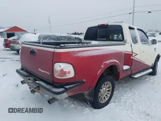 1998 Ford F-150 XL with VIN 2FTRX08L2WCA75995, listed as a Copart auction lot 43717305 with 301,987 mi miles and Salvage title. Bid and sale history available at DreamBid. Image 3.