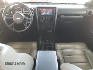 2010 Jeep Wrangler Unlimited Rubicon with VIN 1J4BA6H18AL197855, listed as a Copart auction lot 57748185 with 147,899 mi miles and Salvage title. Bid and sale history available at DreamBid. Image 8.