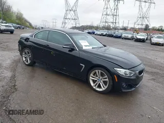 2015 BMW 4 Series 435i with VIN WBA3T3C57FP738517, listed as a IAAI auction lot 41975696 with 61,140 mi miles and . Bid and sale history available at carsss.com. Image 1.