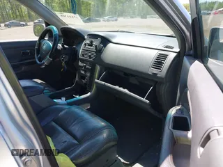 2005 Honda Pilot EX-L with VIN 5FNYF18595B009702, listed as a IAAI auction lot 42144308 with 163,363 mi miles. Bid and sale history available at carsss.com. Image 5.