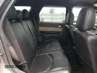 2011 Mercury Mariner Premier z VIN 4M2CN8HG8BKJ07653, wystawiony jako Copart lot #57495725 z przebiegiem 105 624 mil mil oraz Szkoda całkowita • Salvage title. Historia ofert i sprzedaży dostępna na DreamBid. Obrazek 11.