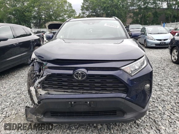 2019 Toyota RAV4 XLE with VIN JTMP1RFV4KD037700, listed as a Copart auction lot 60989525 with 110,577 mi miles and Salvage title. Bid and sale history available at DreamBid. Image 5.