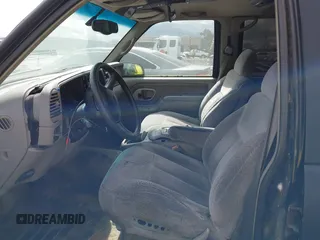 1999 Chevrolet Tahoe Z71 with VIN 1GNEK13R1XJ425996, listed as a IAAI auction lot 41798943 with 203,106 mi miles and . Bid and sale history available at DreamBid. Image 5.