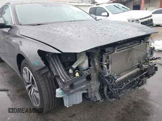 2020 Honda Accord with VIN 1HGCV3F13LA015933, listed as a IAAI auction lot 41720543 with 64,943 mi miles and . Bid and sale history available at DreamBid. Image 12.