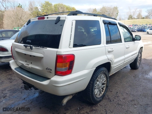 2003 Jeep Grand Cherokee Limited with VIN 1J4GW58N63C505919, listed as a IAAI auction lot 41566997 with 233,827 mi miles. Bid and sale history available at carsss.com. Image 4.