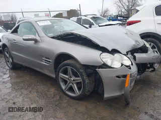 2005 Mercedes-Benz SL 500 z VIN WDBSK75F35F099084, wystawiony jako IAAI lot #41715942 z przebiegiem 114 880 mil mil oraz . Historia ofert i sprzedaży dostępna na DreamBid. Obrazek 1.