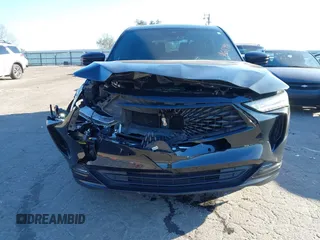 2022 Acura MDX w/A-Spec Package with VIN 5J8YE1H02NL002158, listed as a IAAI auction lot 41633998 with 105,000 mi miles. Bid and sale history available at carsss.com. Image 6.