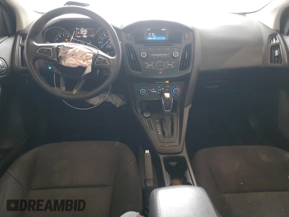 2015 Ford Focus SE с VIN 1FADP3F29FL274320, выставлен на аукционе Copart как лот 55434445 с пробегом 149 126 миль миль и Списание • Salvage title. История ставок и продаж доступна на DreamBid. Изображение 8.