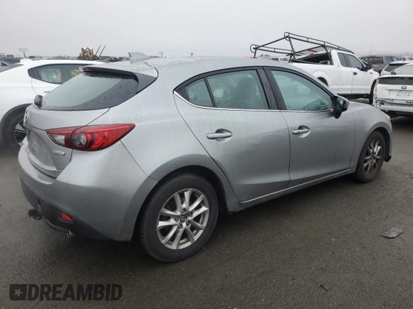 2014 Mazda 3 i Grand Touring with VIN JM1BM1M74E1106463, listed as a Copart auction lot 85144434 with 122,729 mi miles and Salvage Title. Bid and sale history available at DreamBid. Image 3.
