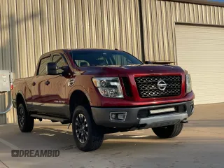2016 Nissan Titan XD PRO-4X with VIN 1N6BA1F40GN516889, listed as a Copart auction lot 81415354 with 124,664 mi miles and Clean Title. Bid and sale history available at carsss.com. Image 1.