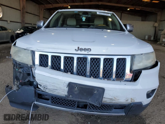 2013 Jeep Grand Cherokee Overland with VIN 1C4RJECG3DC620999, listed as a Copart auction lot 88298985 with 182,219 mi miles and Salvage Title. Bid and sale history available at carsss.com. Image 5.