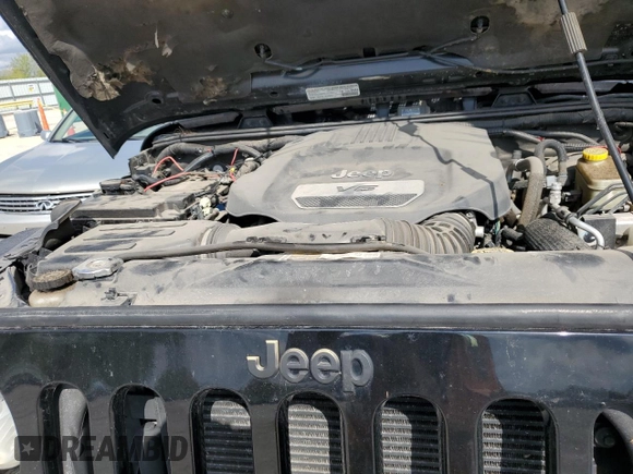 2014 Jeep Wrangler Unlimited Rubicon X с VIN 1C4HJWFG0EL142071, выставлен на аукционе Copart как лот 72898994 с пробегом 110 597 миль миль и Списание • Salvage title. История ставок и продаж доступна на DreamBid. Изображение 11.