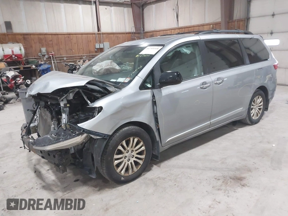 2016 Toyota Sienna XLE with VIN 5TDYK3DC7GS748075, listed as a IAAI auction lot 41795318 with 153,913 mi miles. Bid and sale history available at carsss.com. Image 2.