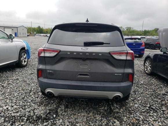 2021 Ford Escape SEL с VIN 1FMCU9H90MUA60766, выставлен на аукционе Copart как лот 56737355 с пробегом 86 183 миль миль и Списание • Salvage title. История ставок и продаж доступна на DreamBid. Изображение 6.