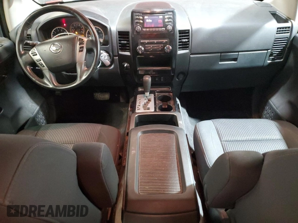 2014 Nissan Titan Pro-4X z VIN 1N6AA0EC6EN501437, wystawiony jako Copart lot #82822234 z przebiegiem 131 112 mil mil oraz Szkoda całkowita • Salvage title. Historia ofert i sprzedaży dostępna na DreamBid. Obrazek 8.