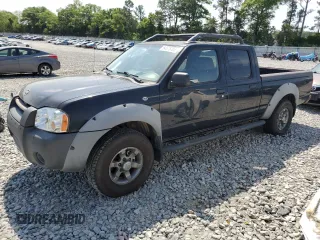 2002 Nissan Frontier XE z VIN 1N6ED29X32C394792, wystawiony jako Copart lot #54575705 z przebiegiem 186 528 mil mil oraz Czysty tytuł • Clean title. Historia ofert i sprzedaży dostępna na DreamBid. Obrazek 1.