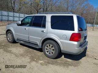 2004 Lincoln Navigator Luxury z VIN 5LMFU27R34LJ05952, wystawiony jako IAAI lot #41853172 z przebiegiem 268 889 mil mil oraz . Historia ofert i sprzedaży dostępna na DreamBid. Obrazek 3.