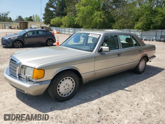 1991 Mercedes-Benz 560 with VIN WDBCA39E9MA599487, listed as a Copart auction lot 51921915 with 59,132 mi miles and Salvage Title. Bid and sale history available at DreamBid. Image 1.