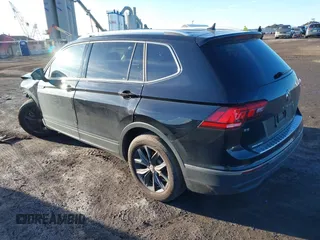 2023 Volkswagen Tiguan SE with VIN 3VVMB7AX8PM032557, listed as a IAAI auction lot 41585975 with 28,706 mi miles and . Bid and sale history available at DreamBid. Image 3.