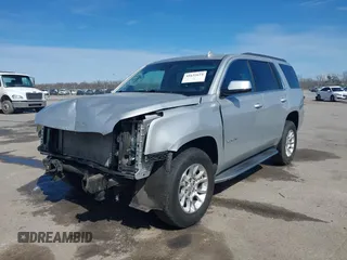 2019 GMC Yukon SLT with VIN 1GKS1BKC5KR277478, listed as a IAAI auction lot 41632624 with 86,770 mi miles. Bid and sale history available at carsss.com. Image 18.