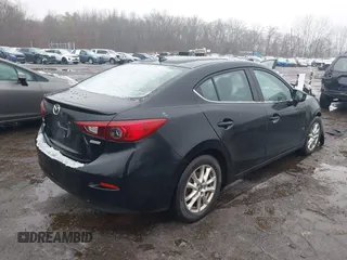 2014 Mazda 3 i Grand Touring with VIN JM1BM1W79E1155302, listed as a IAAI auction lot 41512501 with 98,635 mi miles and . Bid and sale history available at DreamBid. Image 4.