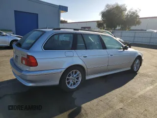 2003 BMW 5 Series 525iAT with VIN WBADS43463GE11741, listed as a Copart auction lot 80497004 with 166,198 mi miles and Clean Title. Bid and sale history available at carsss.com. Image 3.