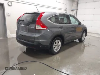 2013 Honda CR-V EX with VIN 2HKRM4H59DH682484, listed as a IAAI auction lot 41504589 with 208,260 mi miles and . Bid and sale history available at DreamBid. Image 4.
