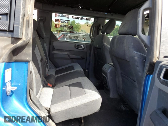 2021 Ford Bronco z VIN 1FMEE5BP9MLA70790, wystawiony jako Copart lot #61759644 z przebiegiem 2 741 mil mil oraz Szkoda całkowita • Salvage title. Historia ofert i sprzedaży dostępna na DreamBid. Obrazek 11.