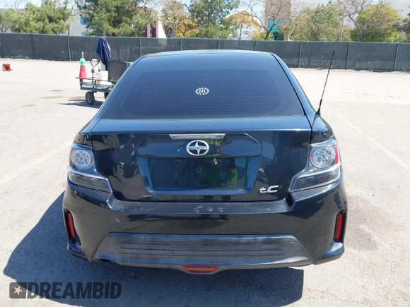 2015 Scion tC with VIN JTKJF5C77F3094936, listed as a IAAI auction lot 41830668 with 89,727 mi miles. Bid and sale history available at carsss.com. Image 17.