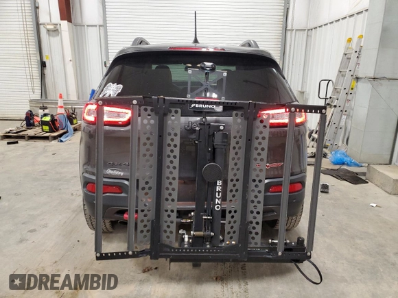 2018 Jeep Cherokee Trailhawk with VIN 1C4PJMBB8JD599791, listed as a Copart auction lot 86650054 with 66,360 mi miles and Non Repairable. Bid and sale history available at DreamBid. Image 6.