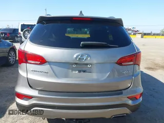 2017 Hyundai Santa Fe 2.4L z VIN 5XYZU3LB4HG446961, wystawiony jako IAAI lot #42214109 z przebiegiem 140 175 mil mil oraz . Historia ofert i sprzedaży dostępna na DreamBid. Obrazek 16.