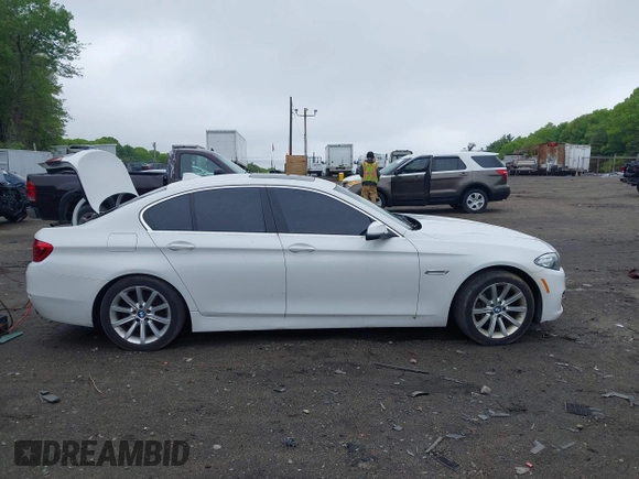 2014 BMW 5 Series 535i xDrive with VIN WBA5B3C57ED538801, listed as a IAAI auction lot 42246097 with 170,219 mi miles and . Bid and sale history available at DreamBid. Image 12.