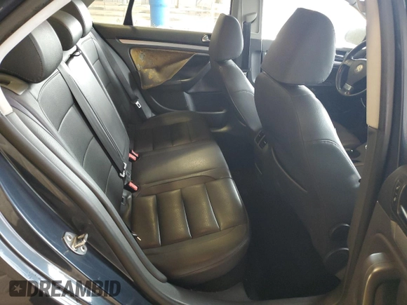 2009 Volkswagen Jetta SE z VIN 3VWRZ71KX9M167334, wystawiony jako Copart lot #63056825 z przebiegiem 187 466 mil mil oraz Szkoda całkowita • Salvage title. Historia ofert i sprzedaży dostępna na DreamBid. Obrazek 10.