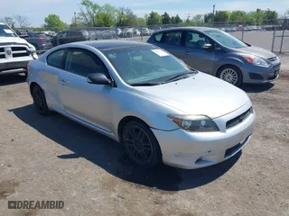 2006 Scion tC with VIN JTKDE177060139123, listed as a IAAI auction lot 42075140 with 218,391 mi miles. Bid and sale history available at carsss.com. Image 1.