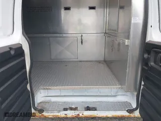 2006 Chevrolet Express Cargo Van with VIN 1GCFG15X661200384, listed as a IAAI auction lot 39232859 with 131,530 mi miles. Bid and sale history available at carsss.com. Image 8.