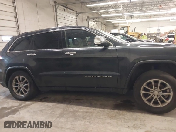 2014 Jeep Grand Cherokee Limited z VIN 1C4RJFBG2EC363245, wystawiony jako IAAI lot #42341795 z przebiegiem 157 366 mil mil oraz . Historia ofert i sprzedaży dostępna na DreamBid. Obrazek 14.