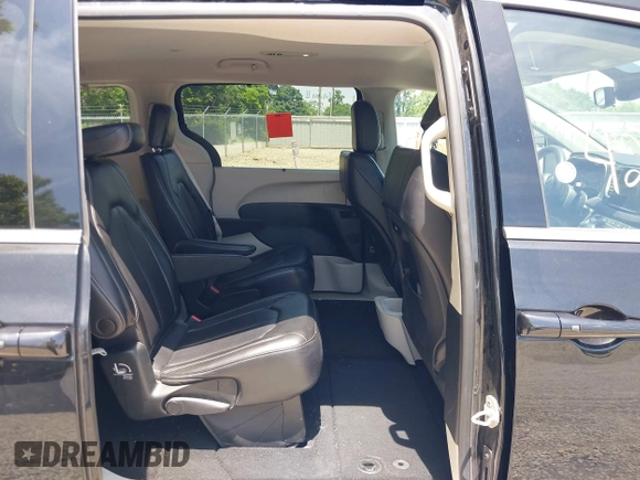 2023 Chrysler Pacifica Touring L with VIN 2C4RC1BG1PR606504, listed as a IAAI auction lot 42647652 with 41,598 mi miles and . Bid and sale history available at DreamBid. Image 8.