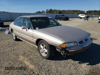 1999 Pontiac Bonneville SE z VIN 1G2HX52K4XH247855, wystawiony jako Copart lot #72559044 z przebiegiem 160 677 mil mil oraz Szkoda całkowita • Salvage title. Historia ofert i sprzedaży dostępna na DreamBid. Obrazek 4.