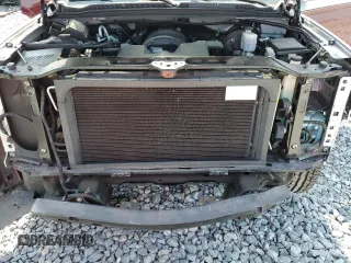 2019 Chevrolet Tahoe LT z VIN 1GNSKBKC1KR395673, wystawiony jako Copart lot #56041725 z przebiegiem 59 766 mil mil oraz Szkoda całkowita • Salvage title. Historia ofert i sprzedaży dostępna na DreamBid. Obrazek 12.